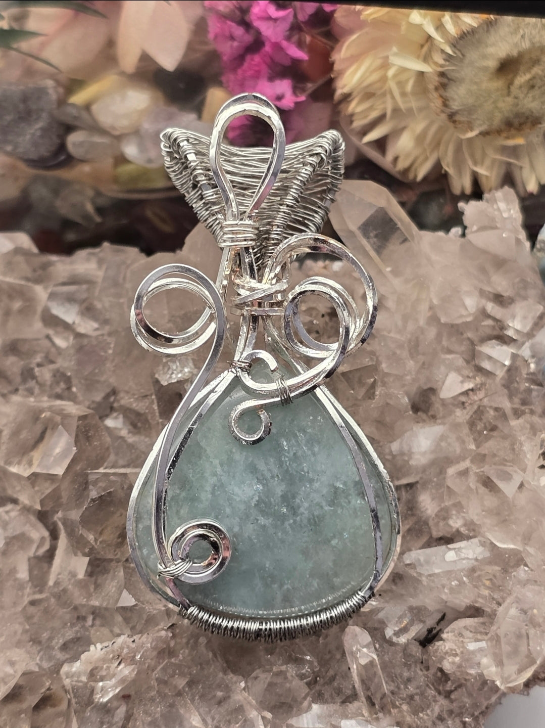 Aquamarine Pendant Wrapped In Silver-Plated Copper Wire