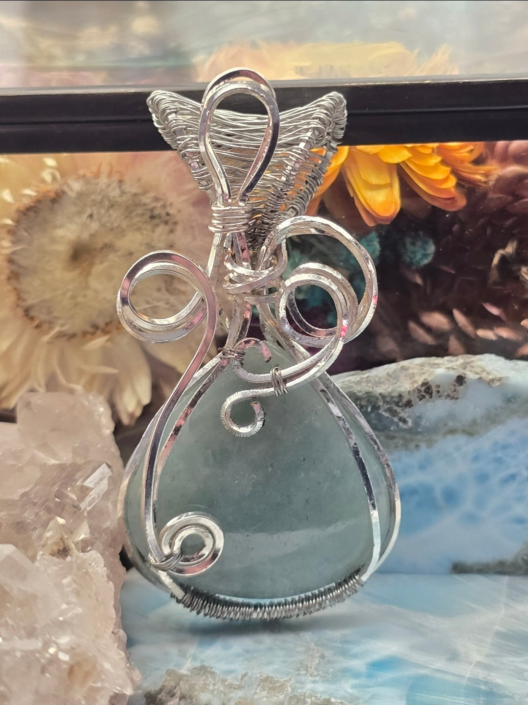 Aquamarine Pendant Wrapped In Silver-Plated Copper Wire
