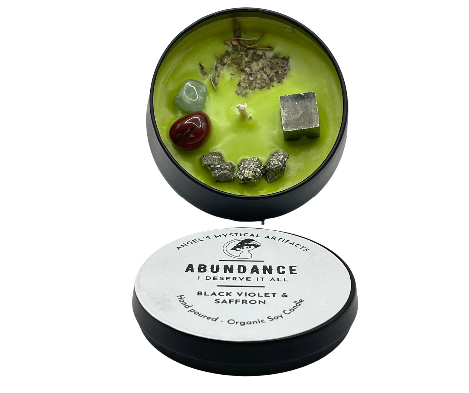 green candle with crystals