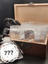 Brown chest containing various mystery satchet bags of miscellaneous soap end pieces