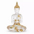 Buddha clear and gold finish statue figurine for spiritual home decor and meditation space, showing serene seated Buddha in dual-tone design