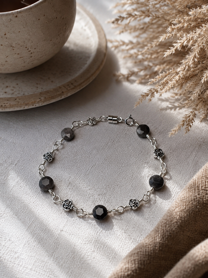 Silver Wire Wrapped Bracelet with Silver Obsidian Gemstones and flower charms.