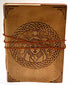 Handcrafted leather journal with triple goddess symbol surrounded by Celtic knot embossing on the cover, tied with a leather cord, 5x7 inches unlined.