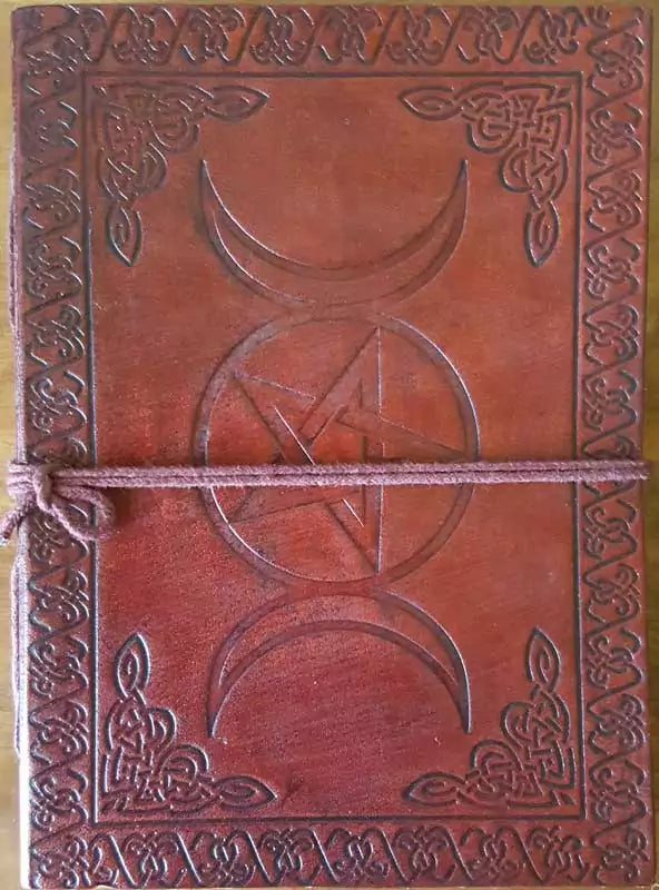 Compact 5 by 7 inch leather-bound journal with Celtic triple moon pentagram embossed cover and cord tie closure for witchcraft journaling