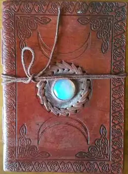 Triple moon goddess stone embossed leather journal 5 by 7 inch with cord closure for moon rituals