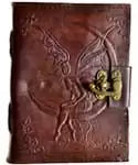 Fairy Moon leather blank book with latch showing whimsical moon and fairy imagery embossed on leather cover, ritual journal for lunar magic and fae tradition writing
