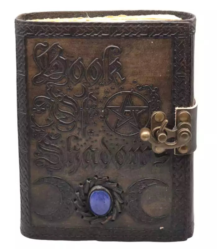 Leather-bound Book of Shadows journal with embossed triple moon design, embedded blue stone, and metal latch closure.