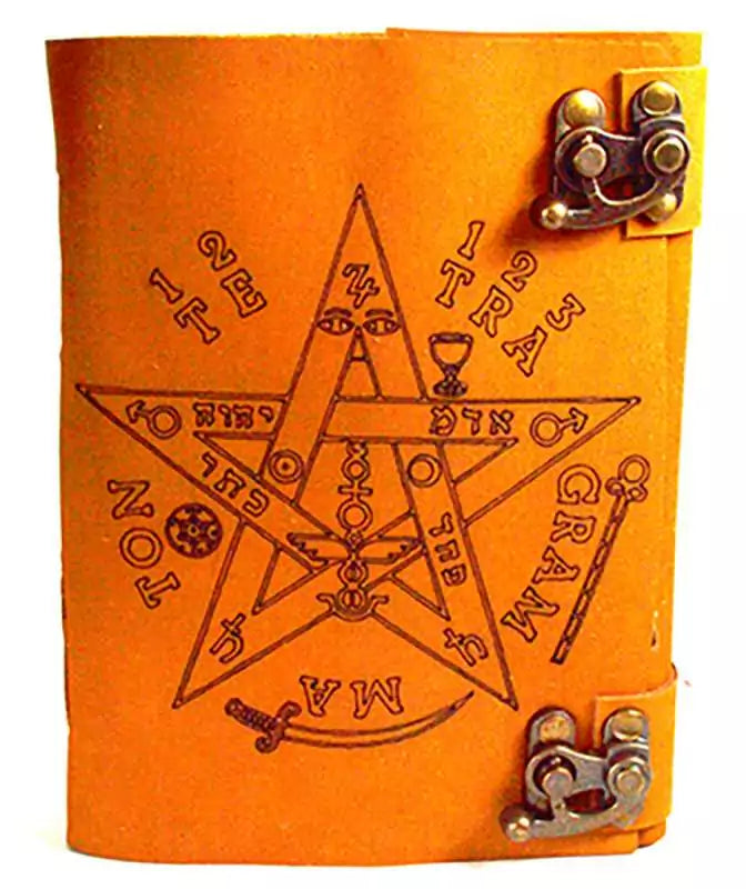 Orange-toned aged leather-look journal with embossed pentagram and Tetragrammaton Hebrew lettering surrounded by mystical symbols, secured with a metal clasp.