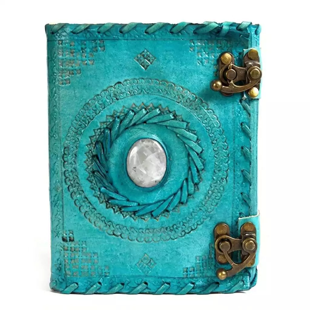 Turquoise blue leather-bound journal with embossed decorative design and embedded stone accent with metal latch closure