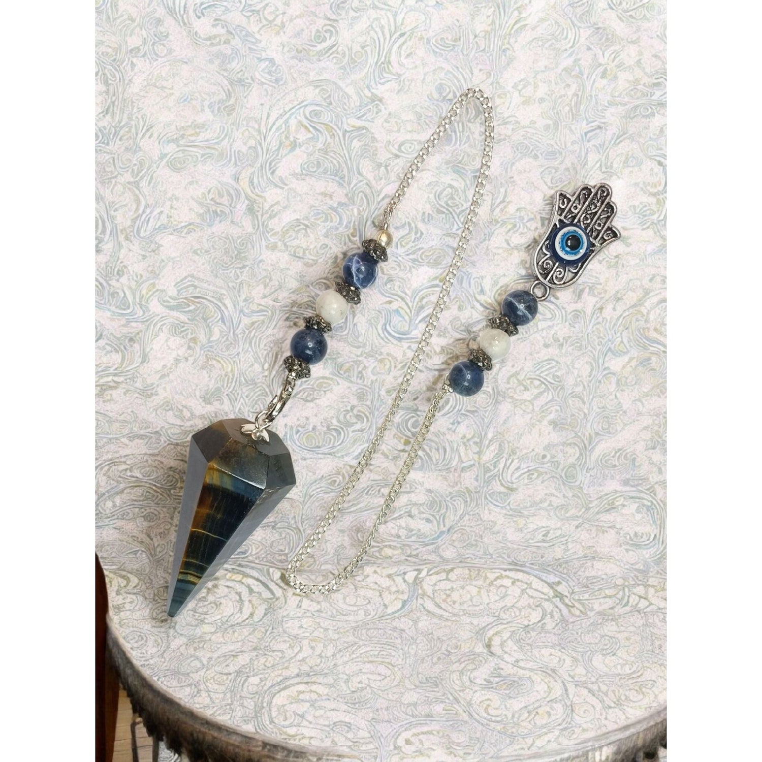 Blue Tiger Eye Pendulum with Fatima Hand &amp; Evil Eye – Hexagonal Crystal Divination Tool