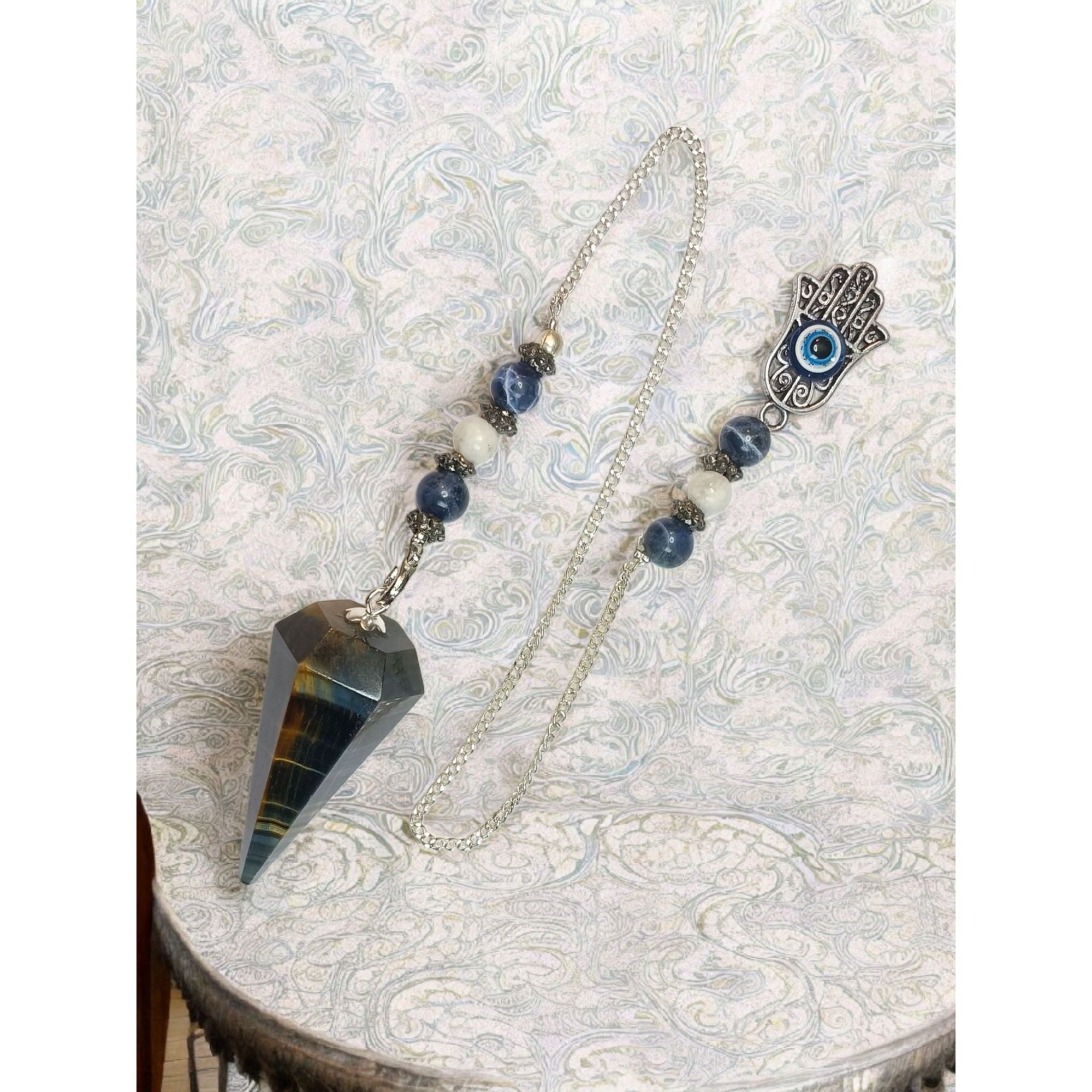 Blue Tiger Eye Pendulum with Fatima Hand &amp; Evil Eye – Hexagonal Crystal Divination Tool