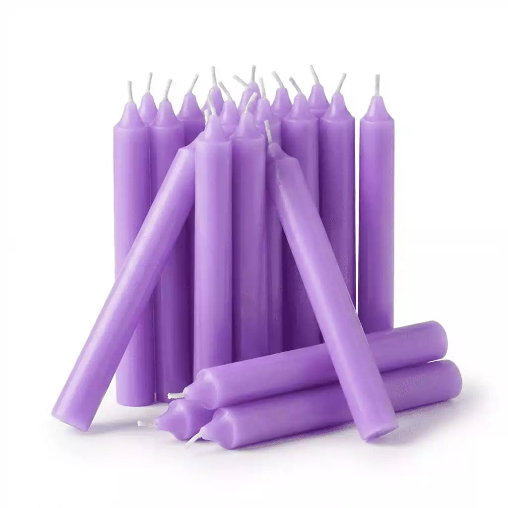 Lavender chime candles 20-pack — cluster of small purple-lavender ritual chime candles for peace, healing, and spiritual communication spell work.