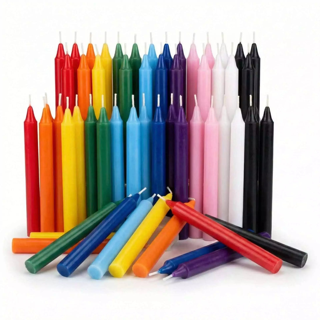 Assorted chime candles in a rainbow of colors — red, yellow, green, blue, purple, and more — arranged in a loose group.