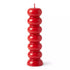 Red seven knob candle — tall stacked spherical red wax candle with seven rounded sections for seven-day love and passion spell work.