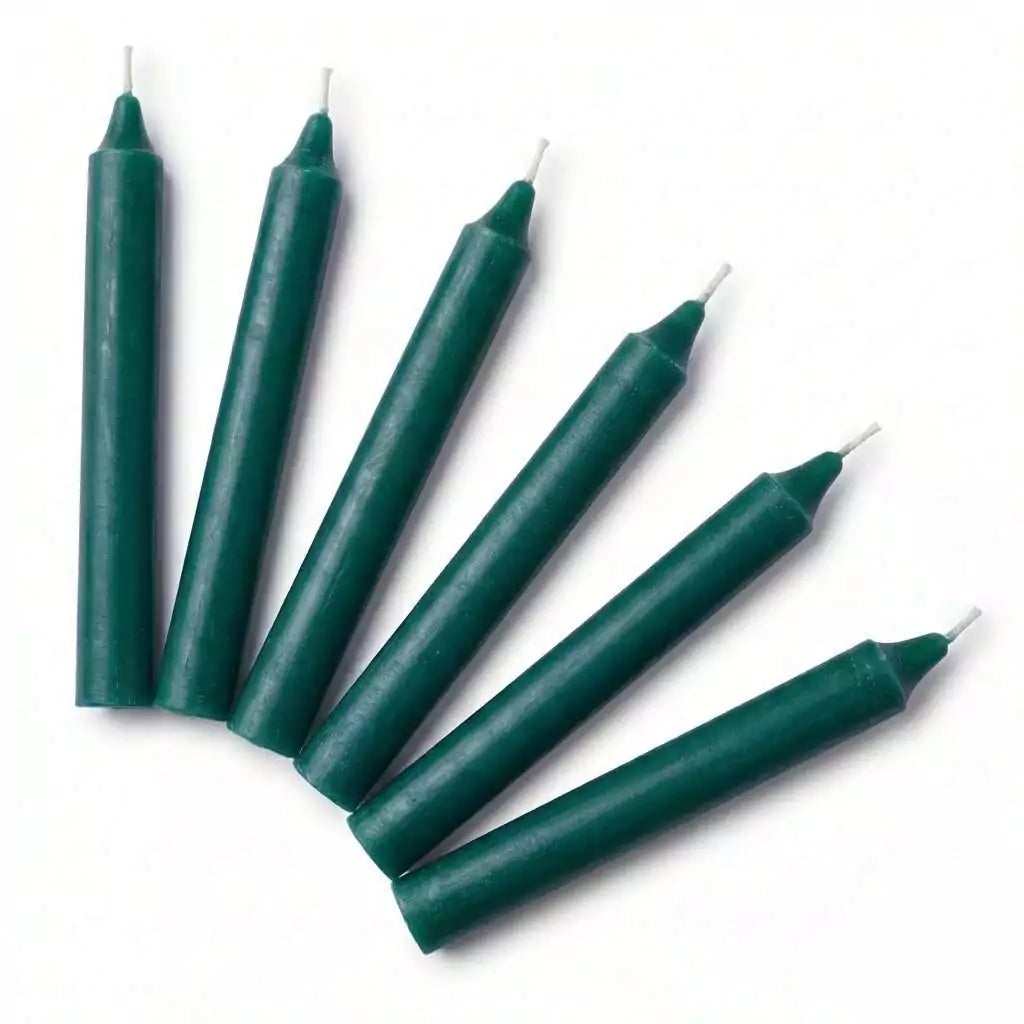 Six green tapered household candles arranged in a row with pointed tips, set of 6 prosperity and abundance ritual candles for money spell work