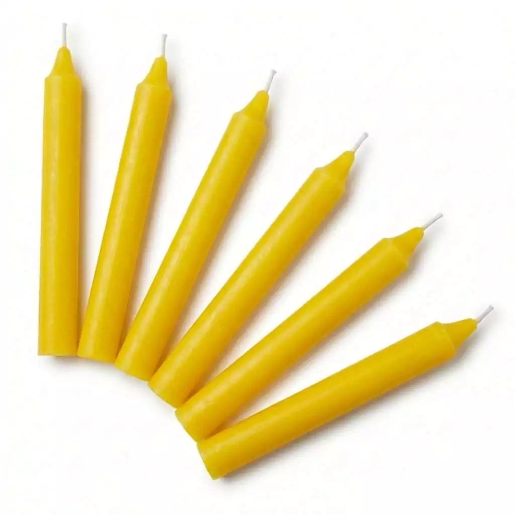 Set of 6 yellow 6-inch household taper candles for ritual use showing vibrant yellow coloring for clarity and solar energy spellwork