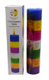 Tall multi-colored 7 Archangels pillar candle with seven distinct color bands, shown beside its informational label card.