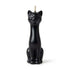 5.5-inch black wax candle sculpted as a sitting cat with a smooth finish and a wick at the top of the head for banishing and hex-breaking ritual burning.