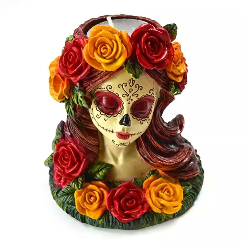 Day of the Dead decorative skull tealight candle holder adorned with colorful painted roses and serene La Catrina expression