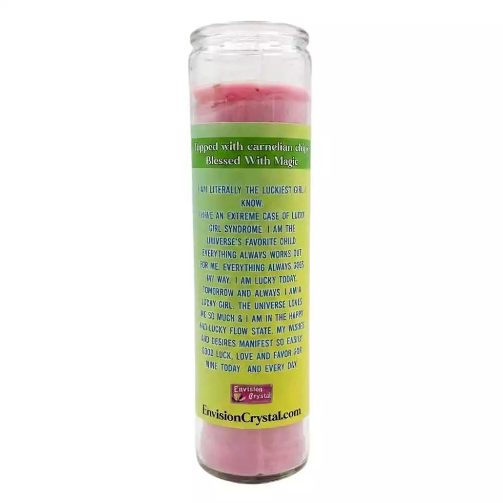 Tall glass candle with pink wax top and Lucky Girl Syndrome manifestation label for abundance and good fortune ritual