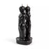 Black dual-figure separation candle showing man and woman forms back to back on a shared base — 6.5-inch hoodoo cord-cutting ritual candle.