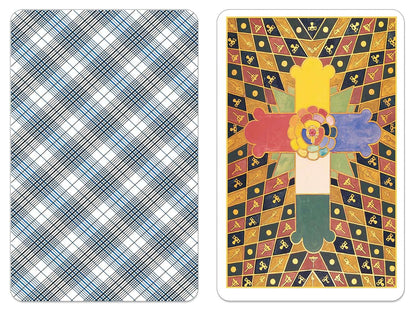Tarot card back design featuring a colorful geometric cross with floral elements — plaid blue reverse pattern shown alongside.