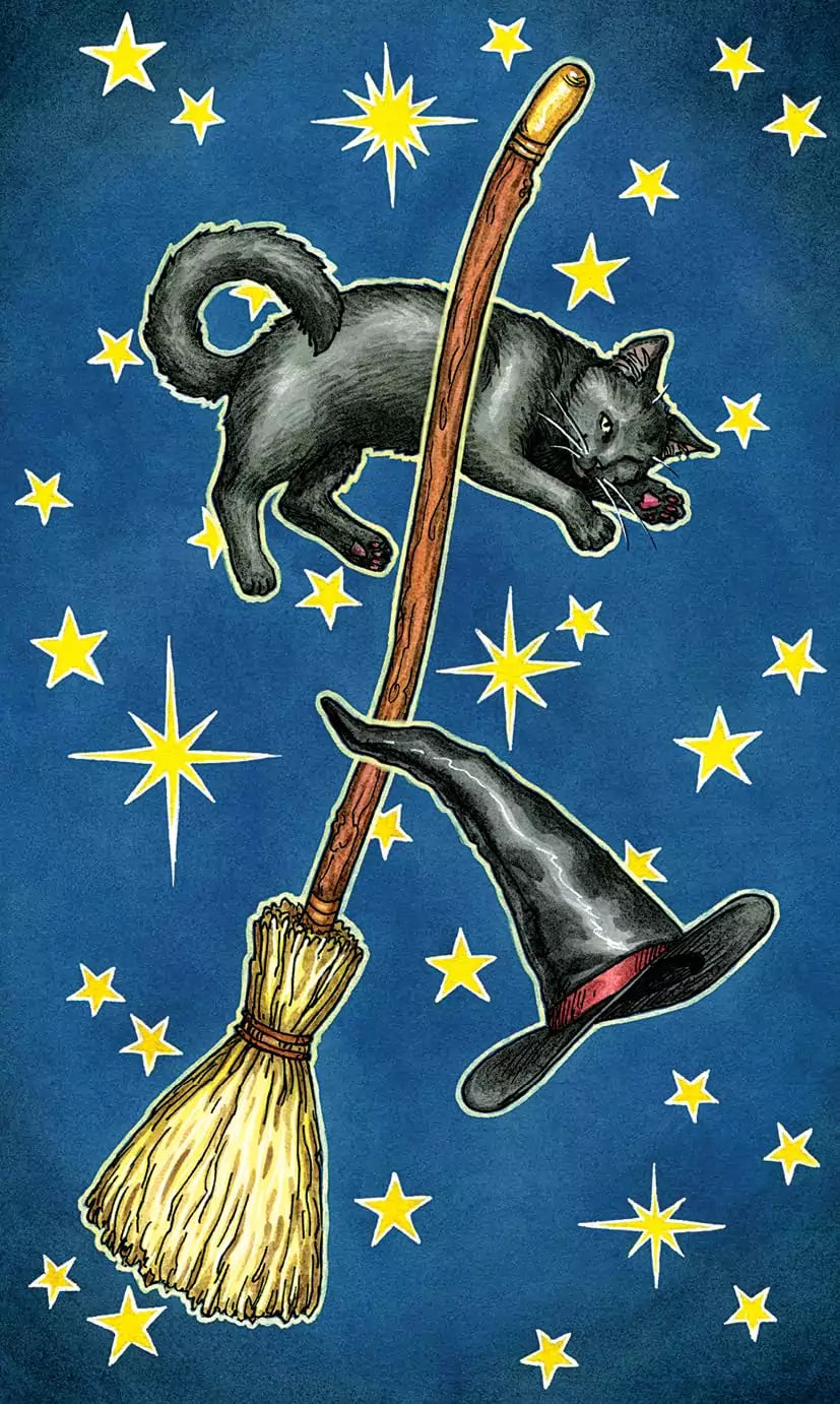 Black cat leaping playfully over a witch&