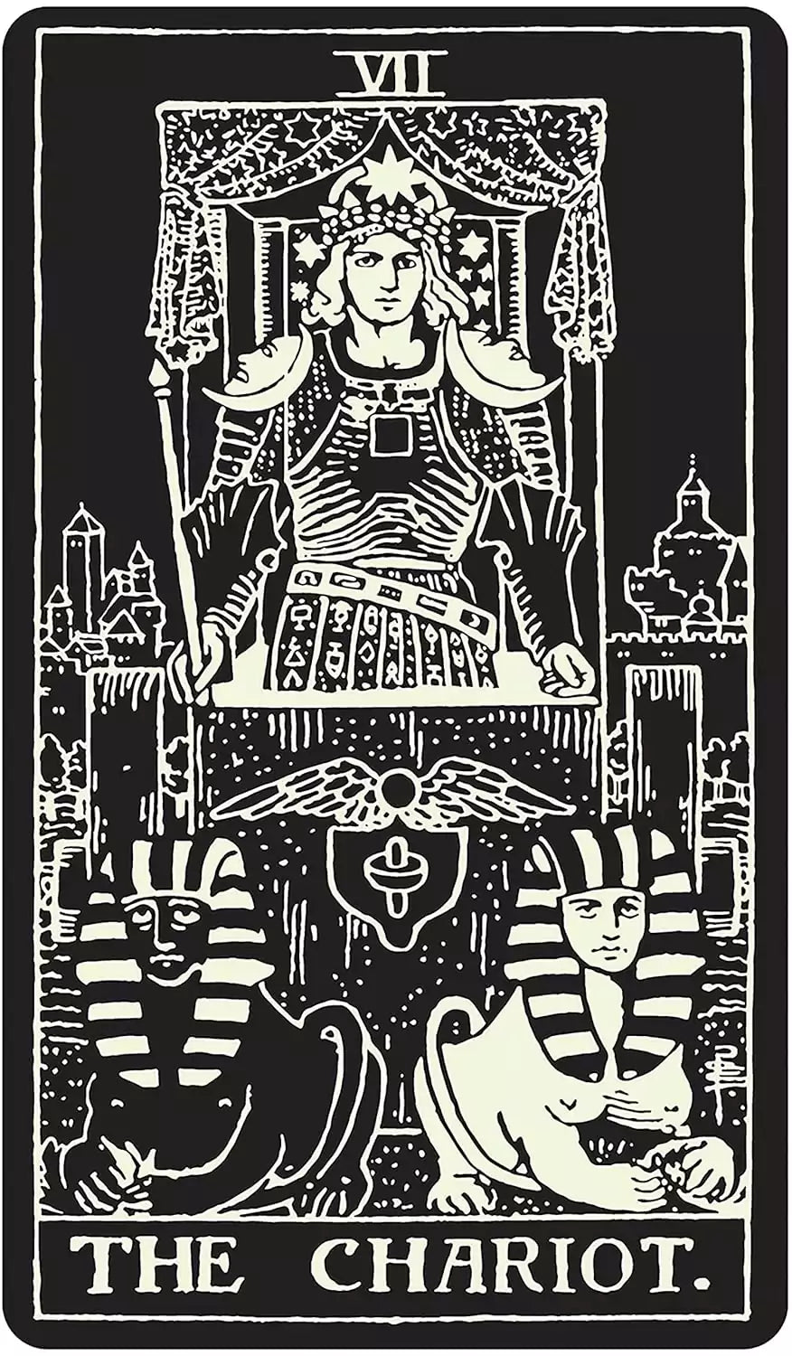 Glow in the Dark Tarot Chariot card featuring an armored charioteer flanked by two sphinxes with a city in the background.
