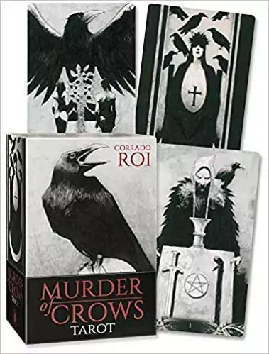 Murder of Crows Tarot box and cards by Corrado Roi featuring dark gothic artwork with crow and mystical figure imagery in black and white.