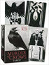 Murder of Crows Tarot box and cards by Corrado Roi featuring dark gothic artwork with crow and mystical figure imagery in black and white.
