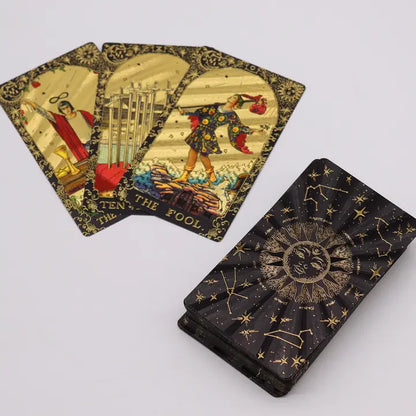 Three Gold Foil Rider-Waite Tarot cards displayed with intricate gold foil detail on classic RWS Major Arcana imagery.