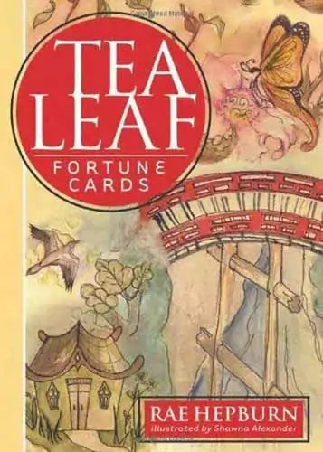 Cover illustration for Tea Leaf Fortune Cards by Rae Hepburn — whimsical butterfly and cottage designs around the title, 200-card oracle deck.