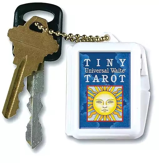 Tiny Universal Waite Tarot keychain deck with the Sun card illustration on the case cover.