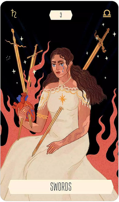 Woman in white dress seated amid flames holding a symbolic object — Zodiac Tarot card with fire imagery.