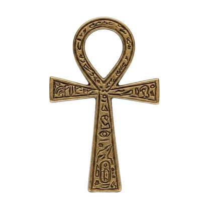 Golden brass ankh symbol with intricate engraving — 2.375 by 4 inch Egyptian Key of Life altar piece with traditional cross-and-loop design.