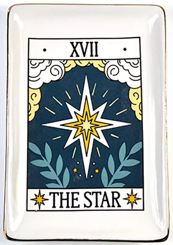 Ceramic dish featuring The Star tarot card motif with a prominent star design, surrounding clouds and foliage, gold edge trim, and tarot card labeling.
