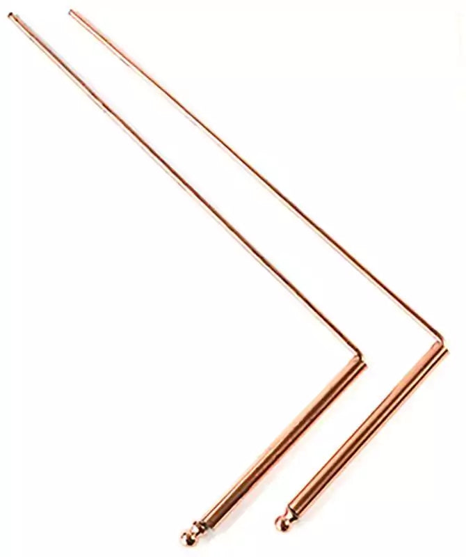 Pair of copper L-shaped dowsing rods with angled handles and long 9.25-inch divining arms, shown side by side on a plain surface.