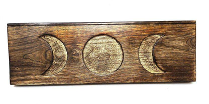 Triple Moon tarot card holder with tarot card displayed in stand showing lunar altar display piece