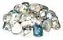 One pound of polished tree agate tumbled stones showing white base with green dendritic inclusions, arranged in a pile on a neutral surface