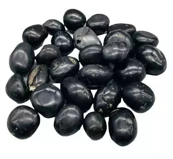 1 lb agni manitite black tumbled tektite stones in 20-22mm size showing smooth polished meteorite-origin surface — Java Indonesia bulk crystal.