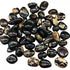 A collection of zebra amber tumbled stones showing distinctive banded striping in warm golden and brown fossilized resin, sold in 1 lb bulk for collectors and ritual work.