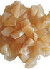 One-pound collection of smooth bright orange calcite tumbled stones for sacral chakra creativity joy emotional block clearing and positive energy confidence