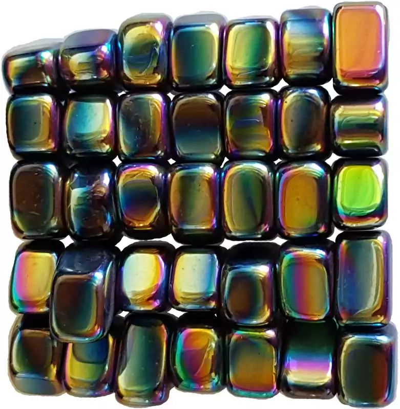 Collection of shiny iridescent rainbow magnetic hematite tumbled stones showing blue, green, purple, and gold metallic surface tones.