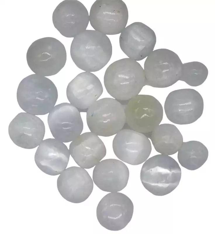 One pound bulk lot of tumbled selenite stones showing smooth white satin-lustre surfaces, polished for chakra alignment and crystal cleansing use.