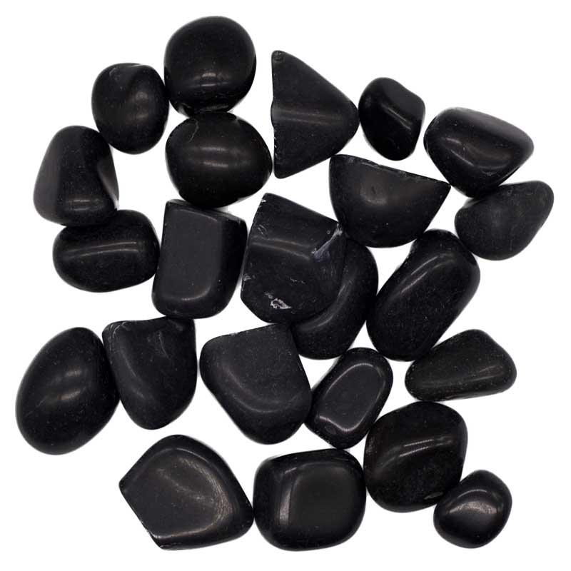 Collection of smooth polished black tourmaline tumbled stones in various shapes and sizes — 1-pound bulk schorl crystals for grounding, protection, and crystal grid work.