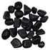 Collection of smooth polished black tourmaline tumbled stones in various shapes and sizes — 1-pound bulk schorl crystals for grounding, protection, and crystal grid work.