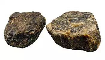 1 lb raw zebra amber fossil resin stones from Indonesia showing distinctive striped dark and golden patterning on rough surfaces.