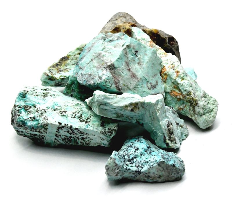 One pound bulk lot of genuine raw untumbled turquoise stones in natural chunks, showing sky-blue to teal coloration with characteristic brown mineral matrix veining.