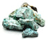One pound bulk lot of genuine raw untumbled turquoise stones in natural chunks, showing sky-blue to teal coloration with characteristic brown mineral matrix veining.