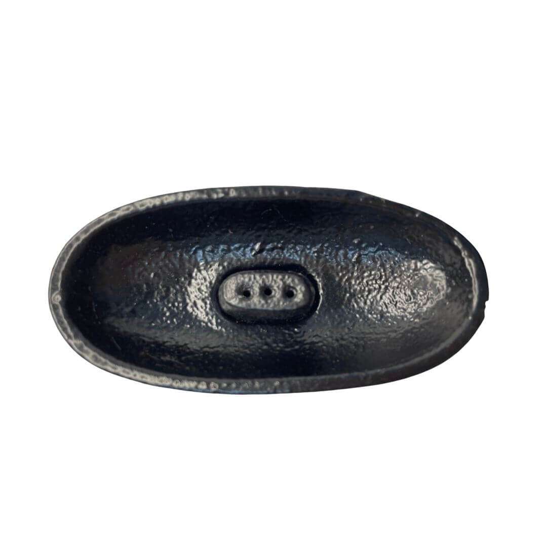 Black oval cast iron cauldron dish with smooth interior and raised rim — 4-inch ritual incense burner for altar work.